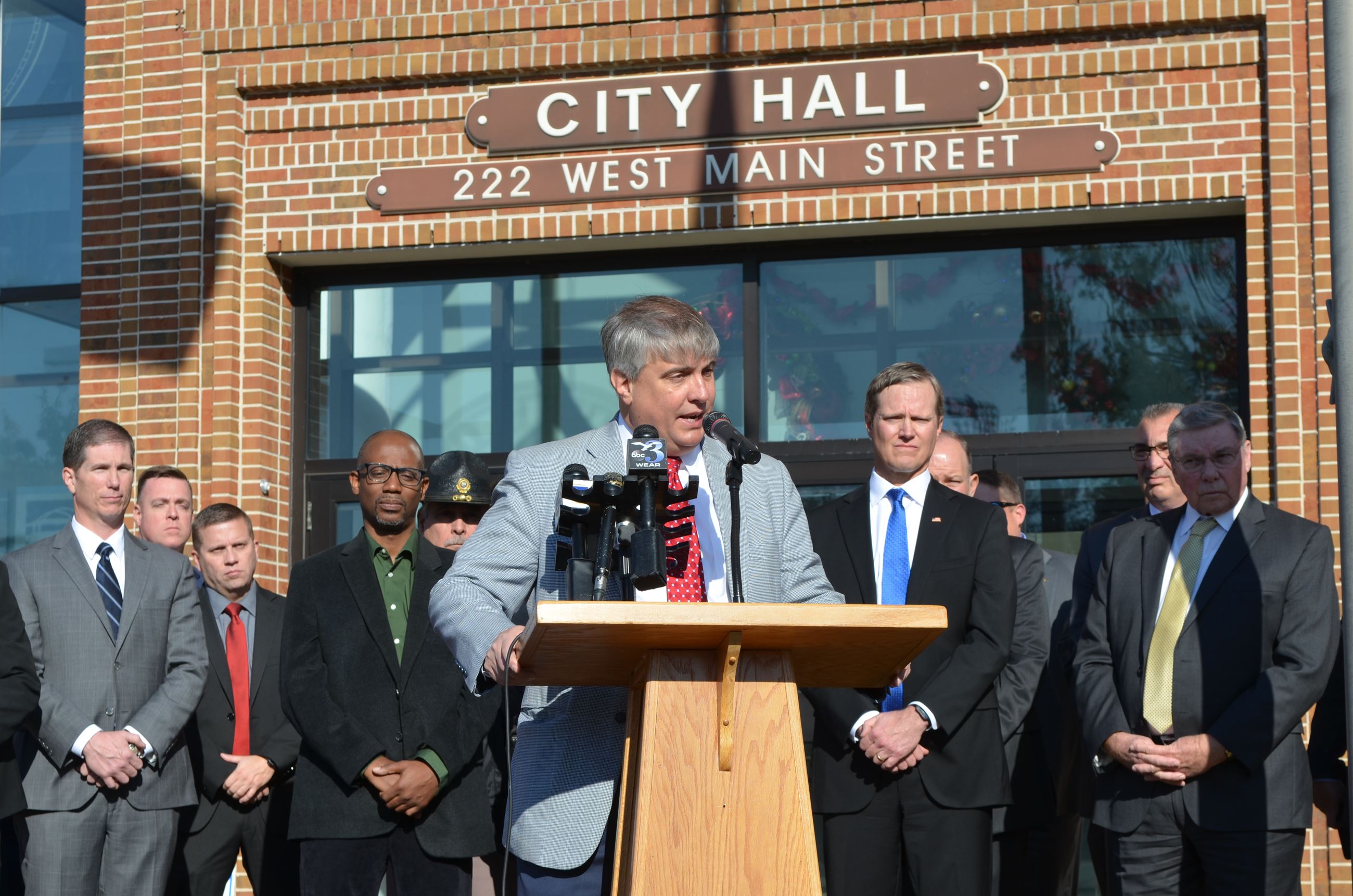 Mayor Grover Robinson speaks at a press conference in front of City Hall