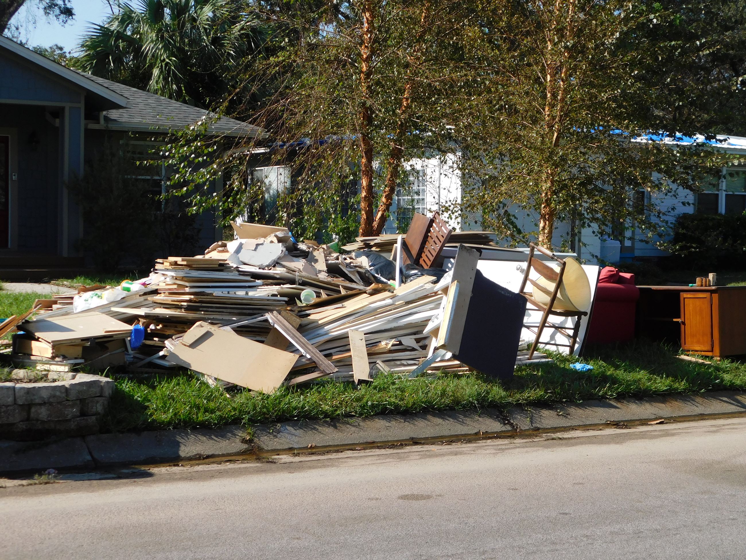 Hurricane Sally debris at the curb for pickup