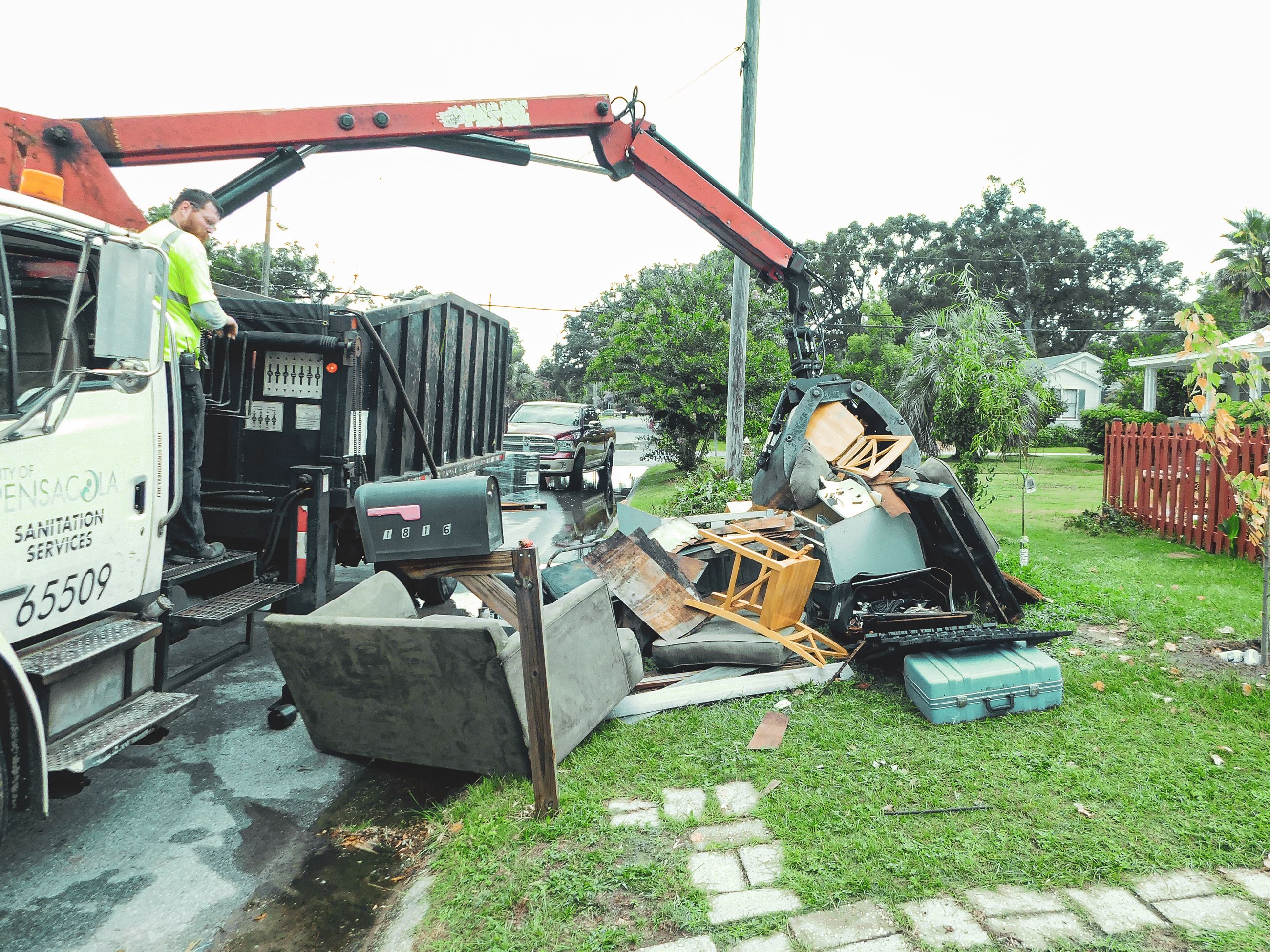 June Neighborhood Cleanup: Truck Picking Up Bulk Waste