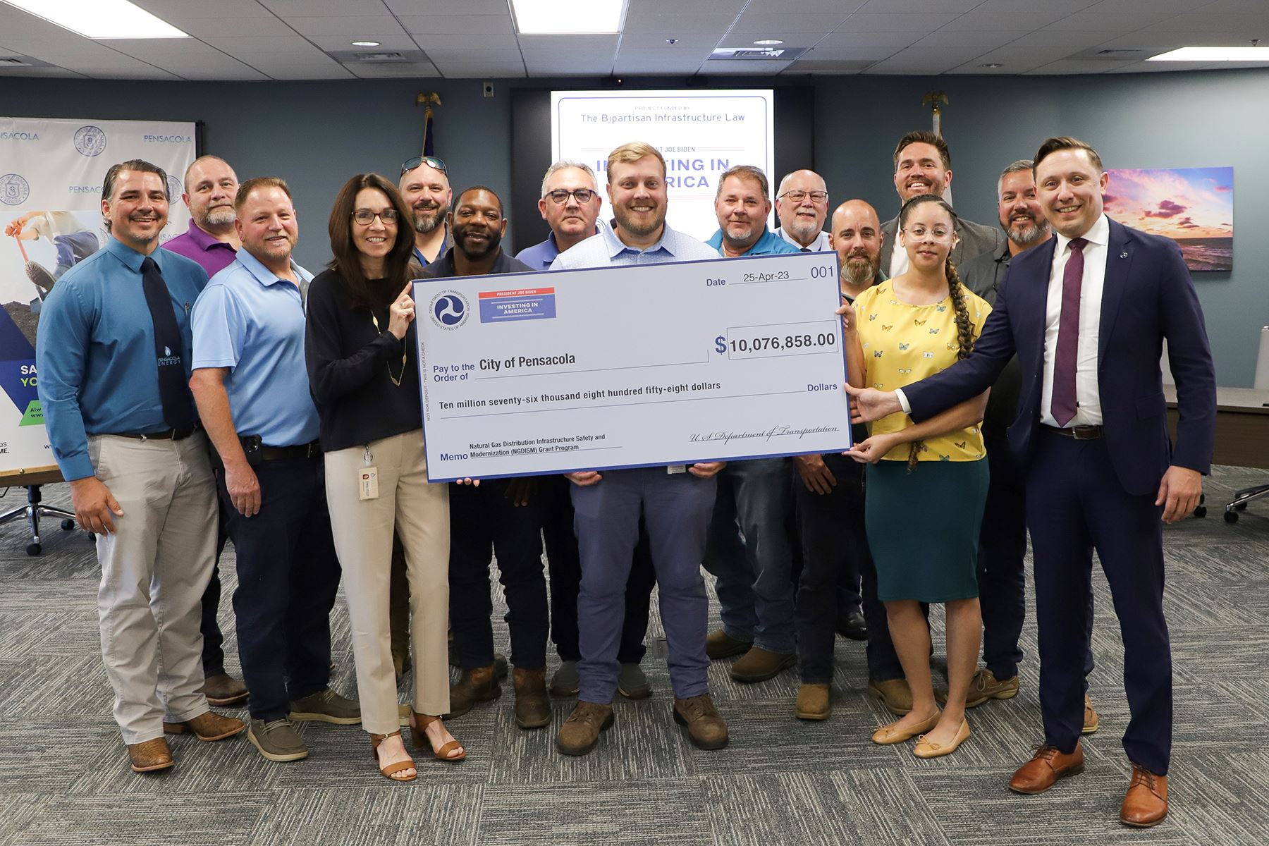Group with giant check